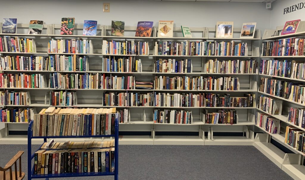 Book shelves in the Book Sale room in Robbins Library.